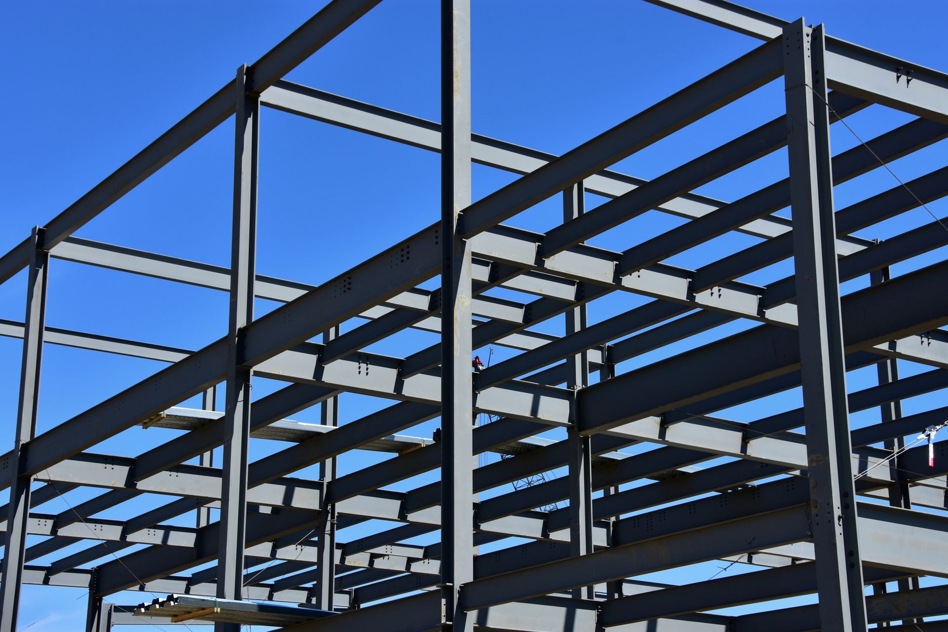Steel frame work of multi story commercial building under construction.